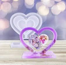 Interlocking purple and white heart-shaped photo displays