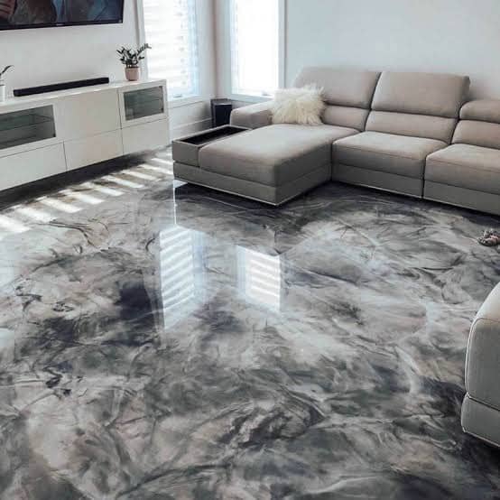 Grey marbled glossy floor in a contemporary living room