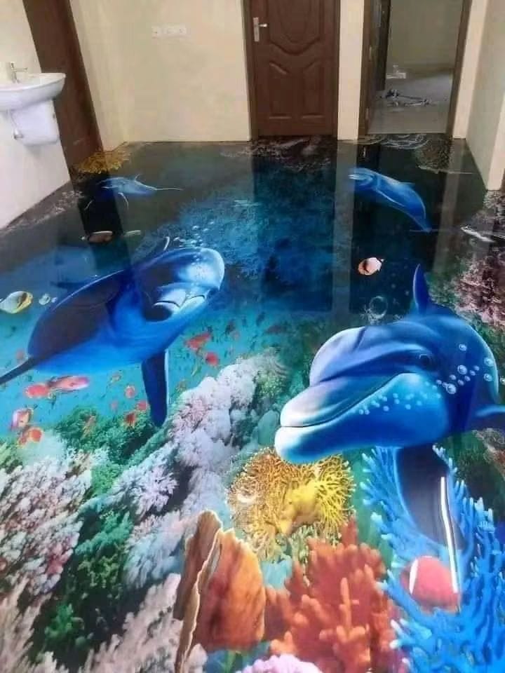 Room floor with a vivid dolphin and coral reef graphic