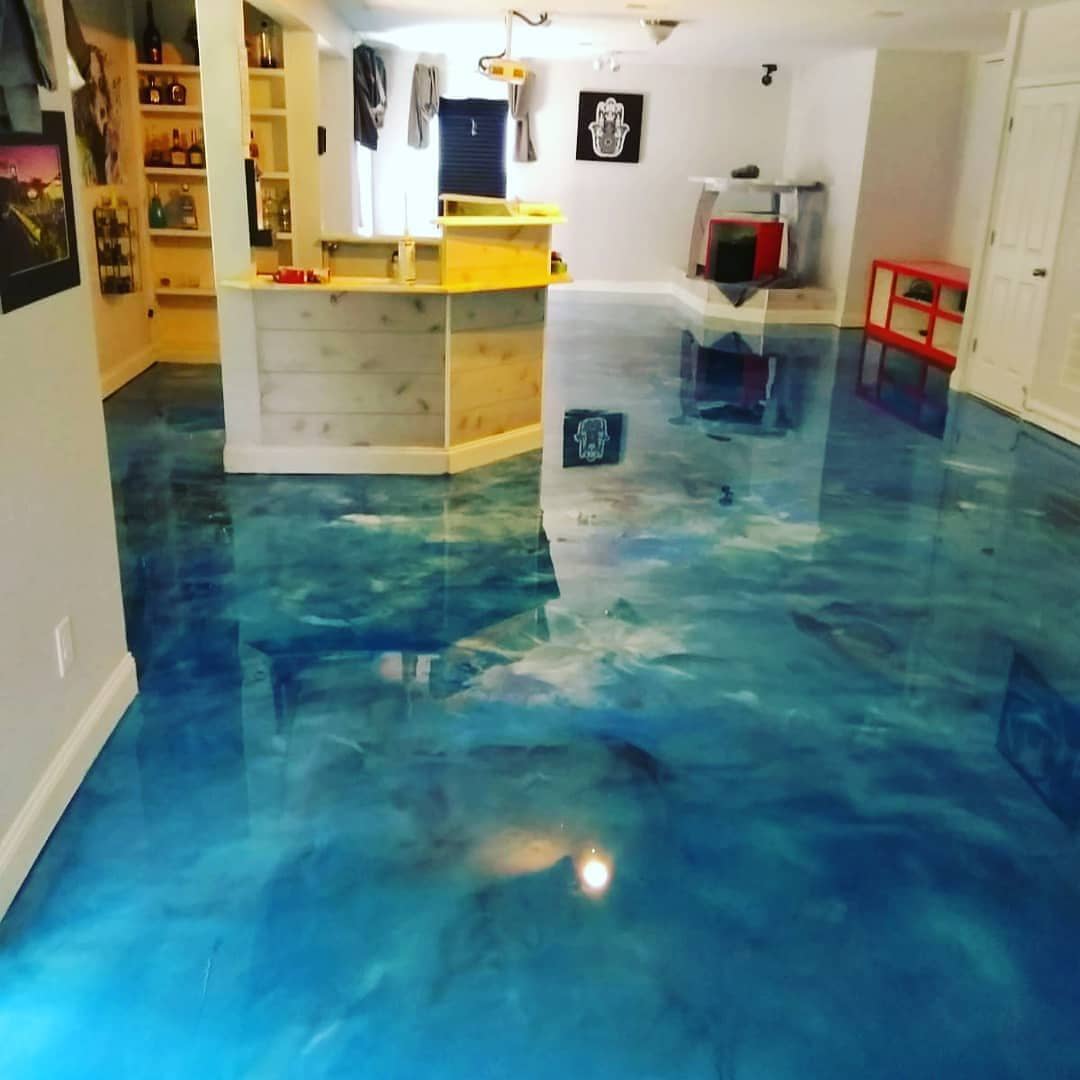Deep blue glossy floor across an open-plan room