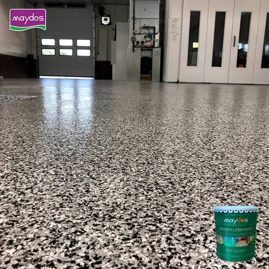 Black-and-white speckled epoxy floor in an industrial space