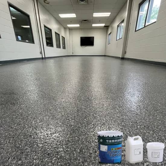 Fine grey speckled floor in a commercial work area